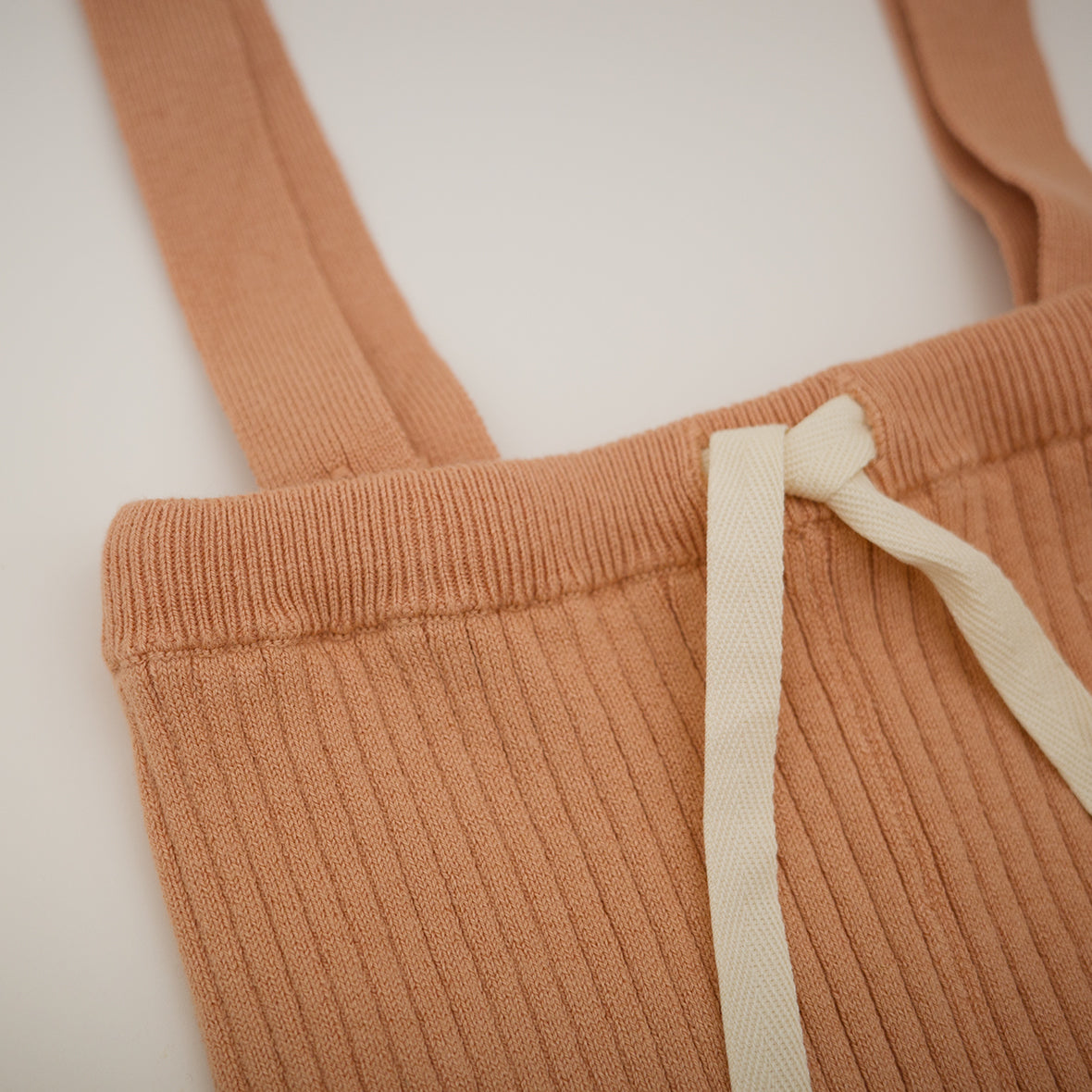 【預購】süß - Knit Unitard Patched on Hip<SALMON>